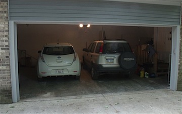 2011 Nissan Leaf in a garage