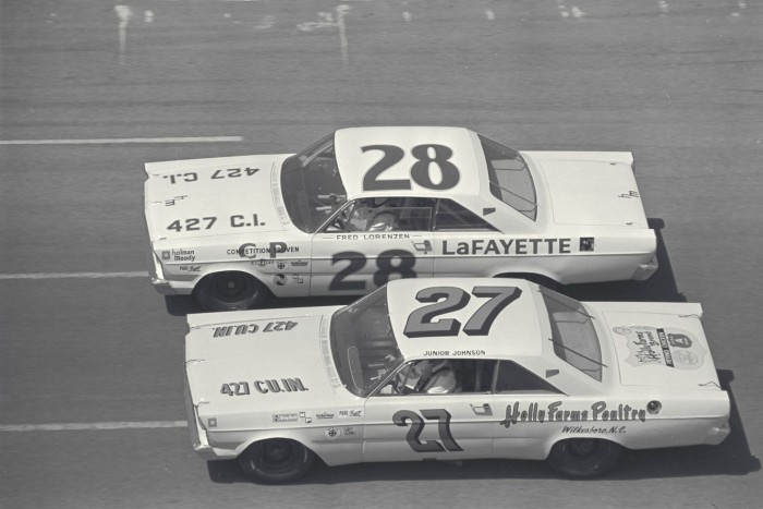 Daytona 500, Daytona, FL, 1965. Freddie Lorenzen (#28) runs wheel to wheel with Junior Johnson (#27).