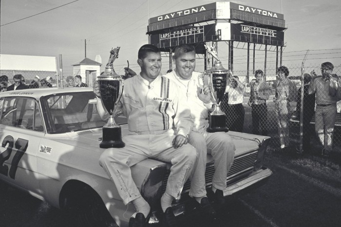Daytona 500, Daytona, FL, 1965. Darel Dieringer-16 (2nd) and Junior Johnson in victory lane.